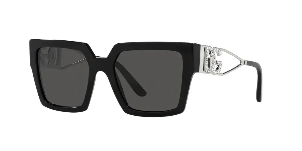 Dolce & Gabbana 0DG4446B oversized black sunglasses with silver detailing and dark lenses. Stylish and chic eyewear.