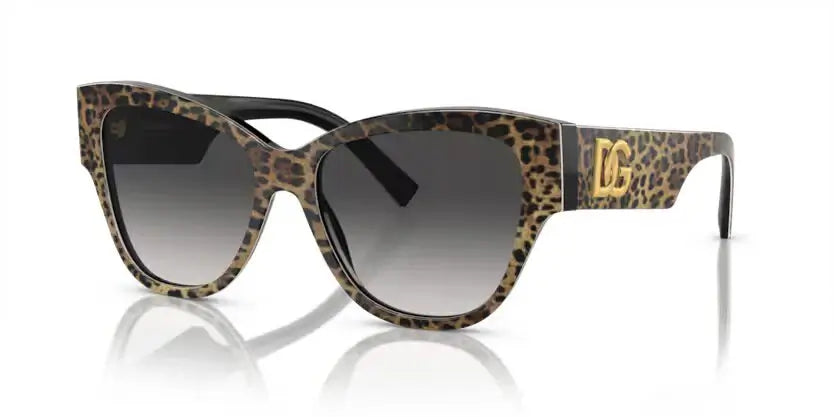 Dolce & Gabbana 0DG4449 leopard print sunglasses with gradient lenses, stylish cat-eye design.