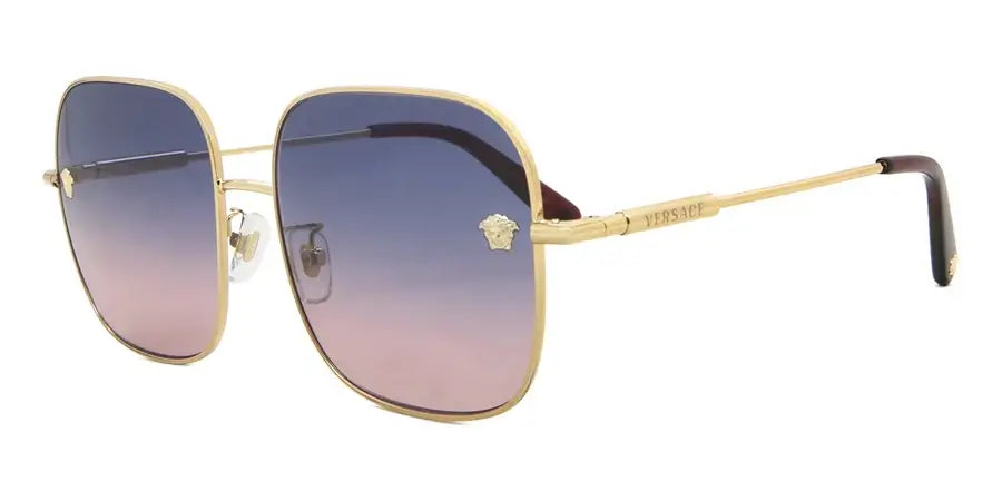 Versace 0VE2246D sunglasses featuring stylish gradient lenses and gold frame, perfect for trendy summer looks.