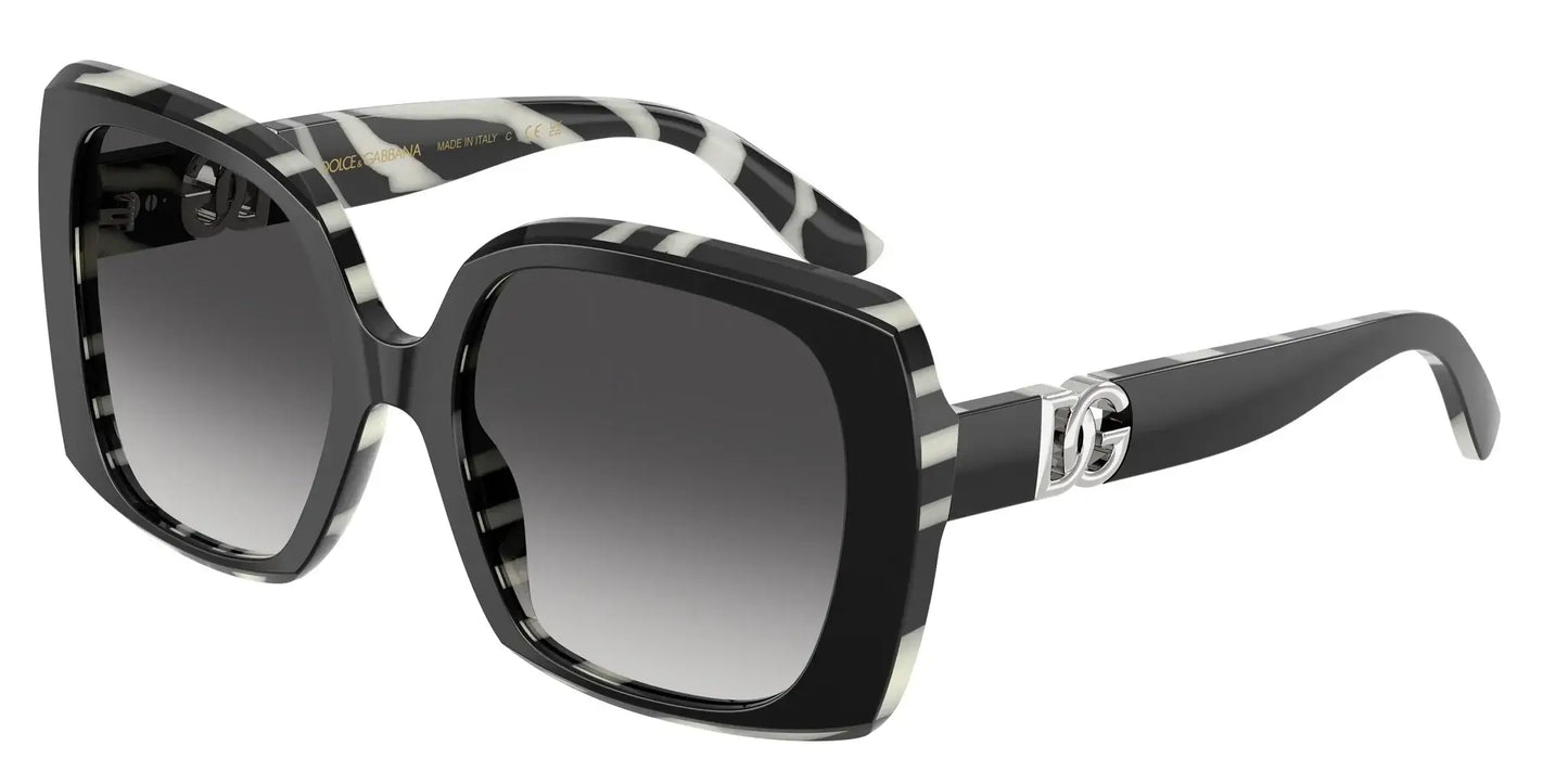 Dolce & Gabbana 0DG4475 oversized sunglasses with bold zebra stripes and logo detail, perfect for stylish sun protection.