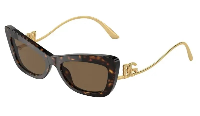 Dolce & Gabbana 0DG4467B sunglasses in brown tortoiseshell with gold detailing, stylish cat-eye design.