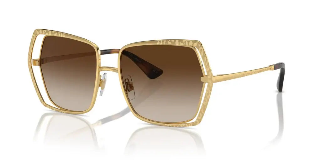 Dolce & Gabbana 0DG2306 oversized sunglasses featuring a gold frame and gradient brown lenses. Stylish eyewear for a chic look.