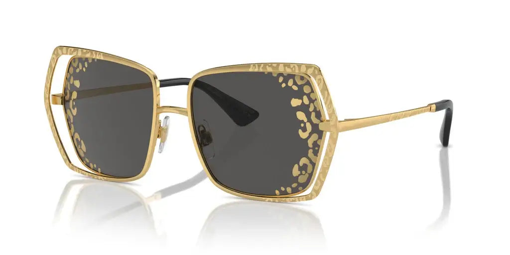 Dolce & Gabbana 0DG2306 luxury sunglasses with gold frame and bold leopard print detailing, showcasing elegant style.