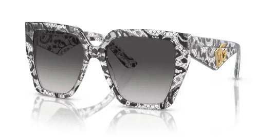 Dolce & Gabbana 0DG4438 sunglasses featuring a unique lace pattern and gradient lenses for a stylish look.