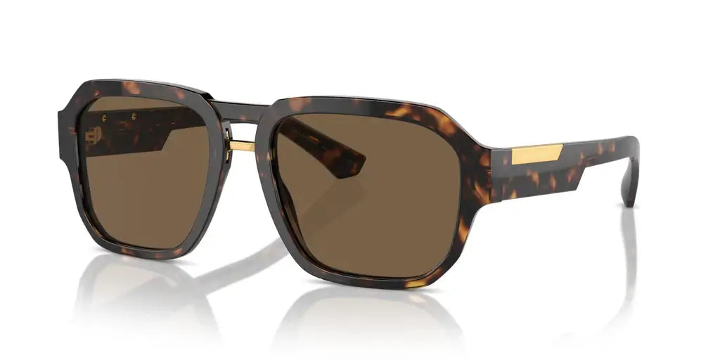 Dolce & Gabbana 0DG4464 sunglasses in tortoiseshell pattern with brown lenses, stylish and sophisticated eyewear.