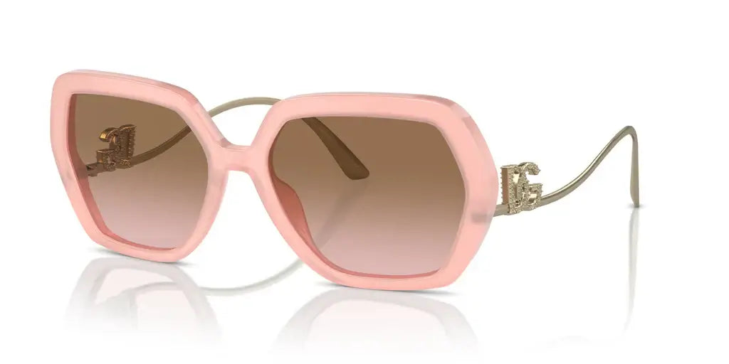 Stylish Dolce & Gabbana 0DG4468B oversized pink sunglasses with elegant gradient lenses and gold detailing.