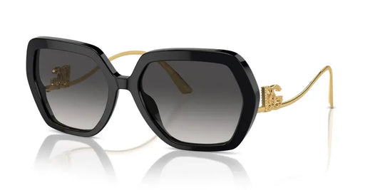 Dolce & Gabbana 0DG4468B oversized black sunglasses with gold accents and gradient lenses. Stylish and luxurious eyewear.
