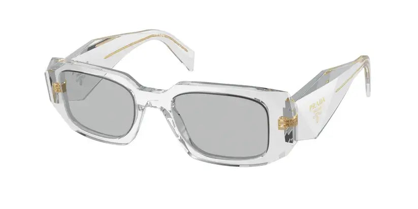 PRADA 0PR 17WS Transparent sunglasses featuring a stylish clear frame and gray lenses, perfect for a chic look.