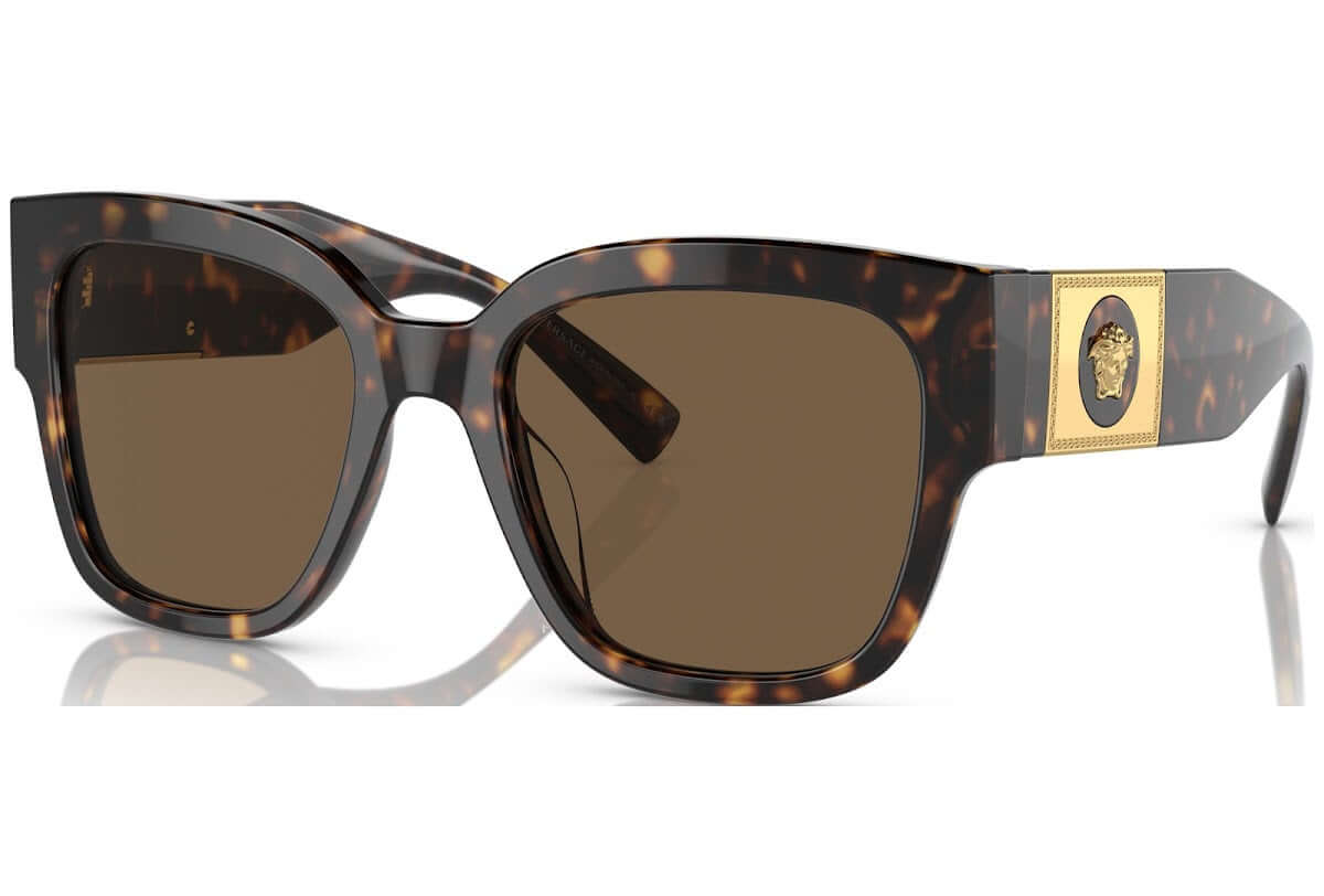 Versace 0VE4437U sunglasses in tortoiseshell design with brown lenses and gold medallion detail.