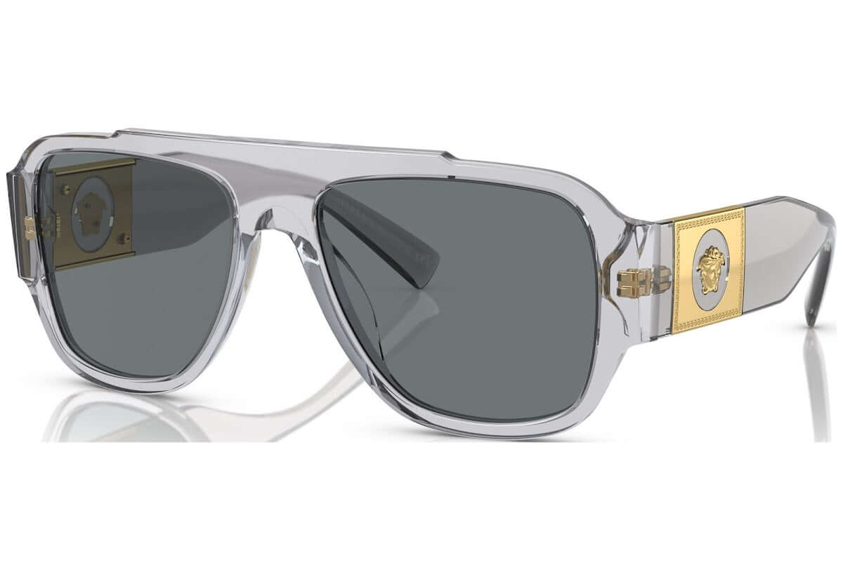 Versace 0VE4436U sunglasses featuring a clear frame and tinted lenses with gold logo detail on the side.