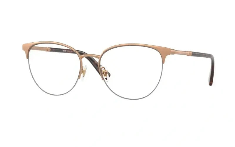 Versace VE1247 eyewear featuring elegant cat-eye design with gold accents and clear lenses for a chic look.